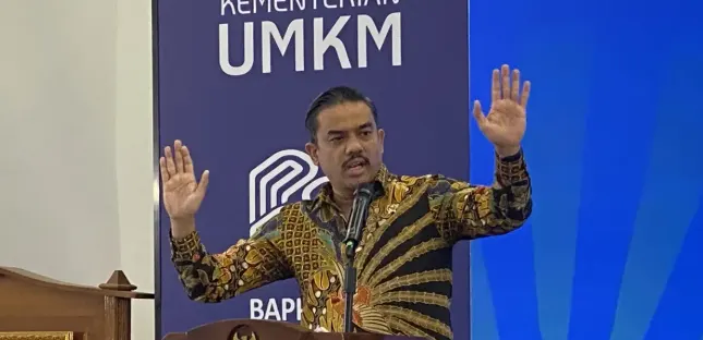 Deputi Bidang Usaha Kecil Kementerian UMKM, Temmy Satya Permana, dalam sambutannya pada acara Workshop Akses Kredit Program Perumahan bagi UMKM Ekosistem Perumahan di Pontianak.